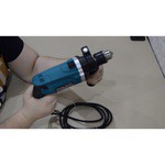 Дрель ударная Makita HP1630KX1 710 Вт